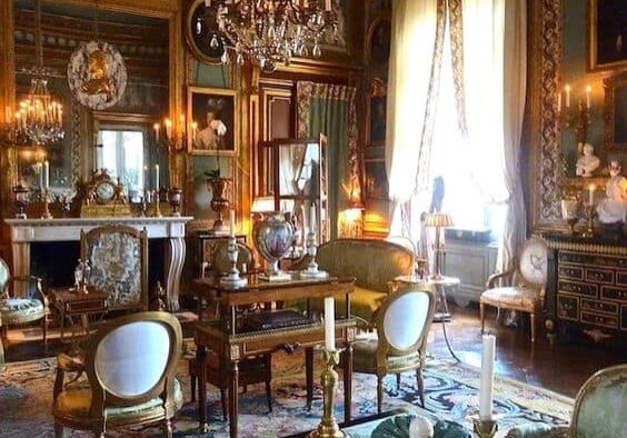 Luxurious vintage interior with decorative antique furniture, chandeliers, and collectibles, illustrating valuable antiques in an estate.